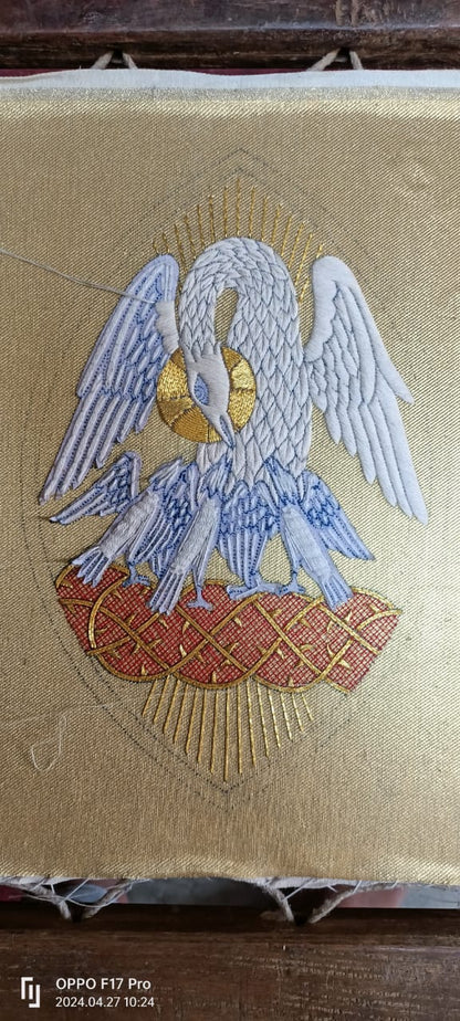 Pelican Emblem Appliqué for Catholic Vestments Sewn On Gold Cloth
